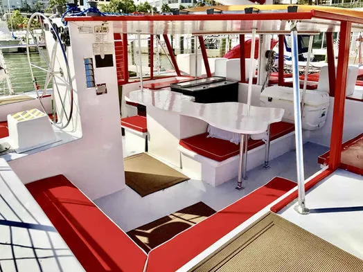 Helm station steering wheel and cockpit lounge seating on the 60ft Catamaran Mariah