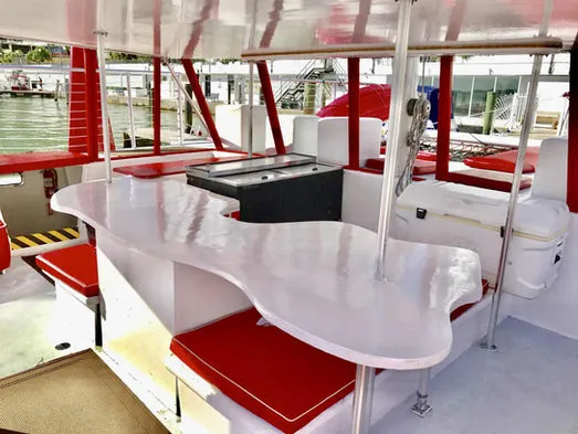 Spacious bar and serving counter in the covered cabin of the 60ft Catamaran Mariah