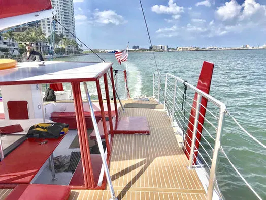 Wide and secure side deck walkway of 60ft Catamaran Mariah during a Miami cruise