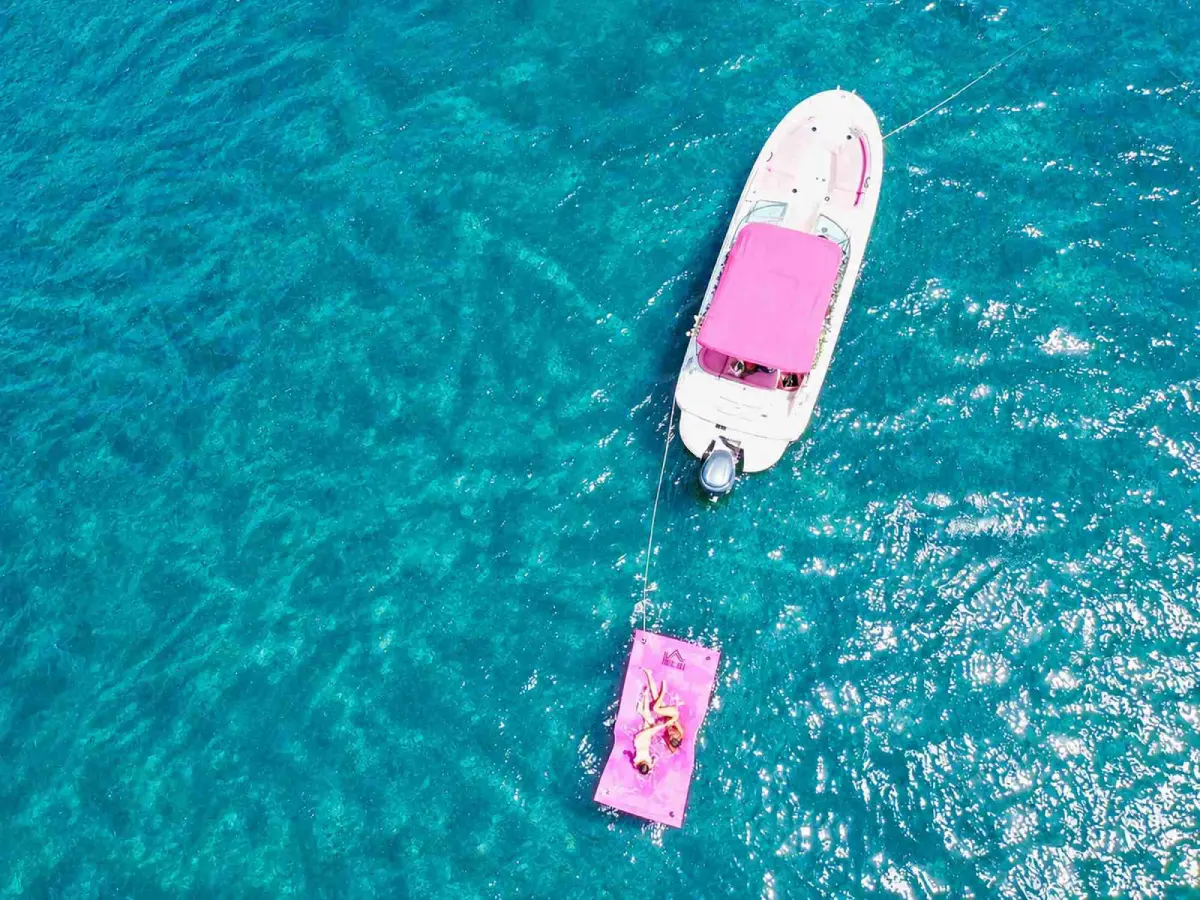 26ft pink Sea Ray Miami from above with pink floating mat
