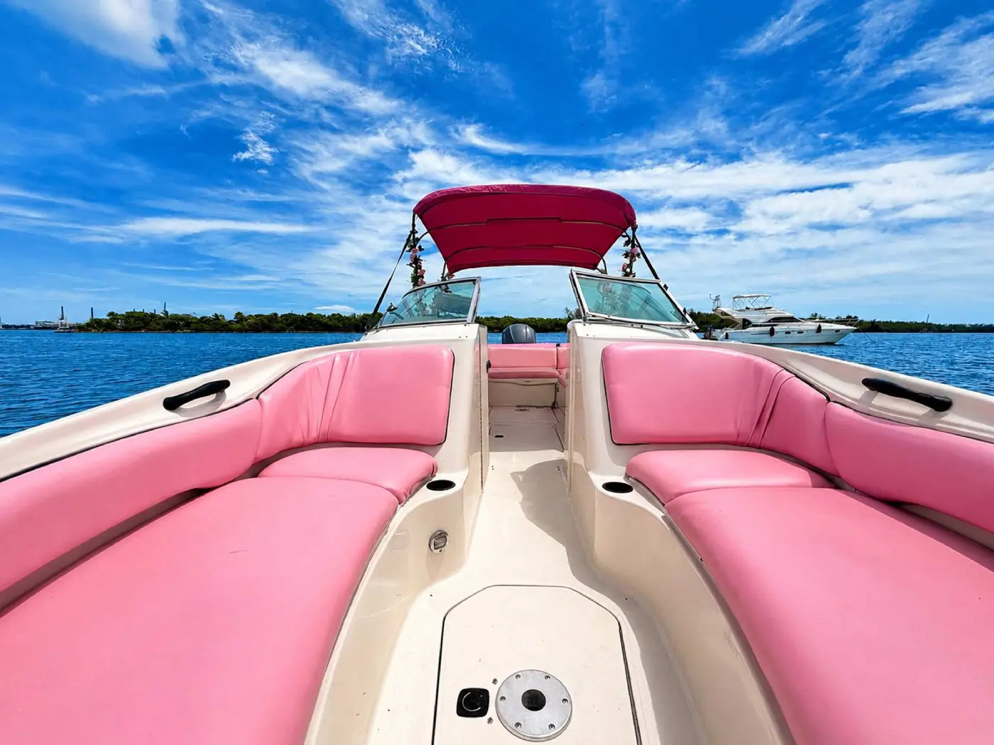 26ft pink Sea Ray Miami bow lounge with pink cushions