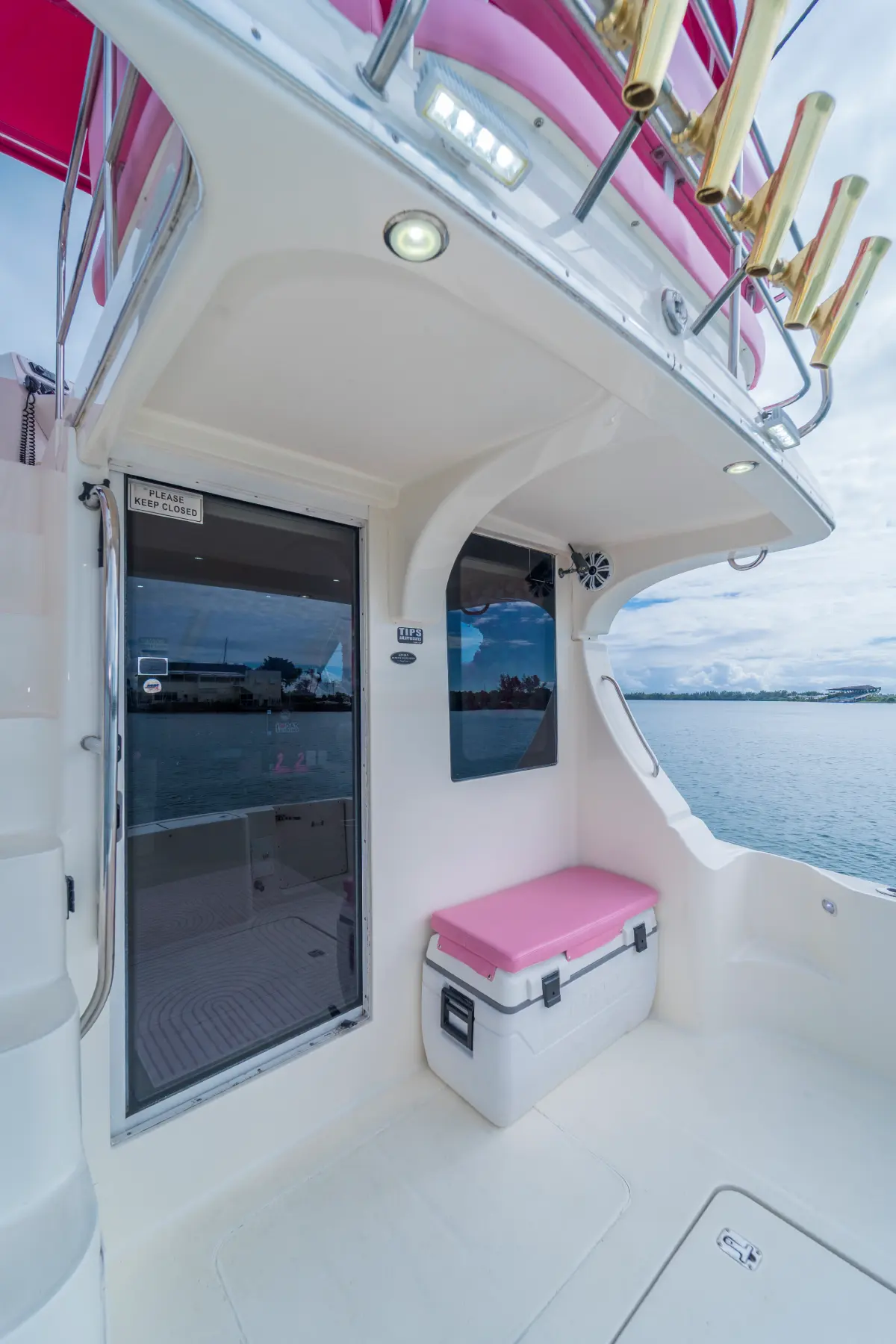 41ft pink Silverton yacht Miami aft deck with pink seat cushion