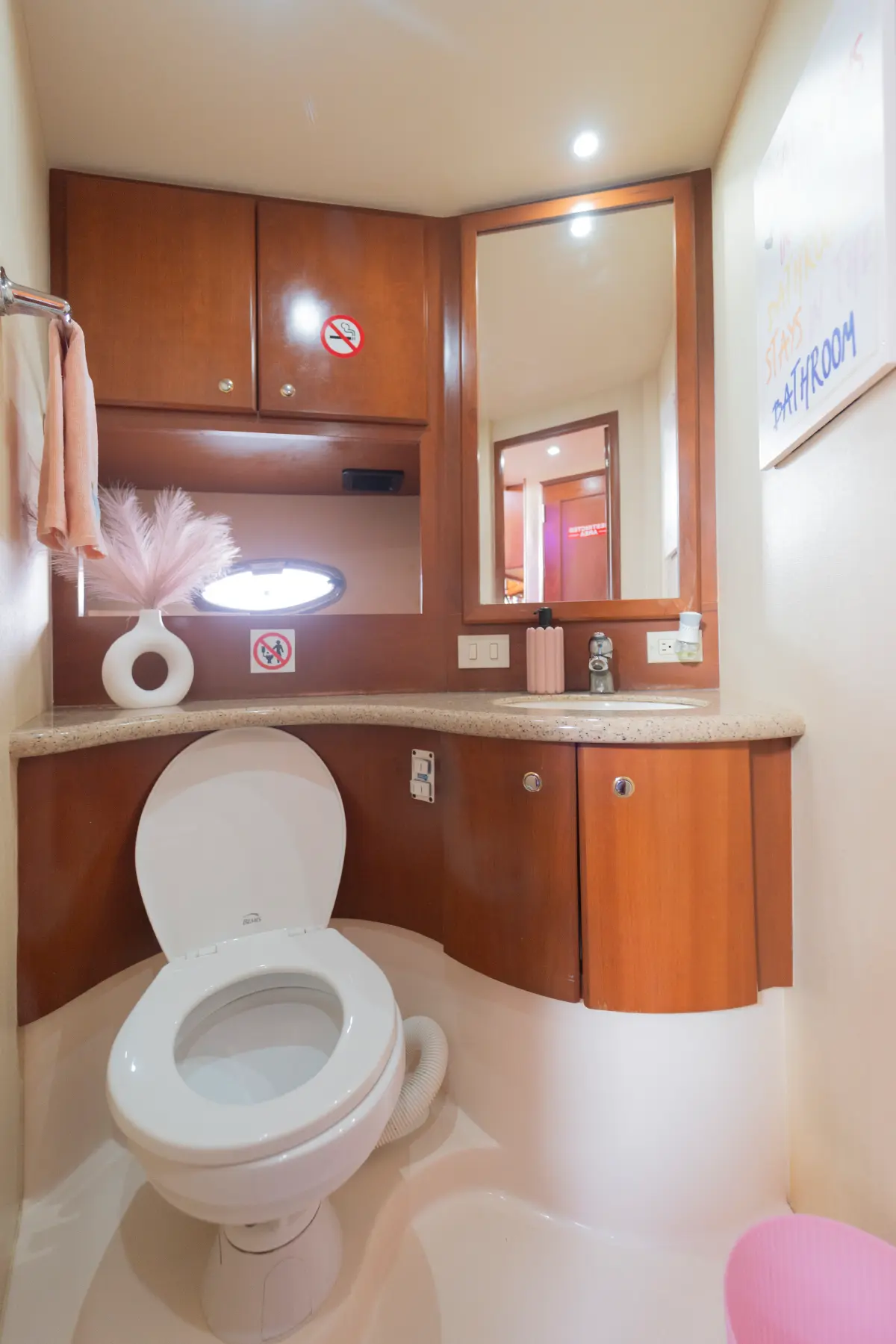 41ft pink Silverton yacht Miami bathroom with vanity and mirror