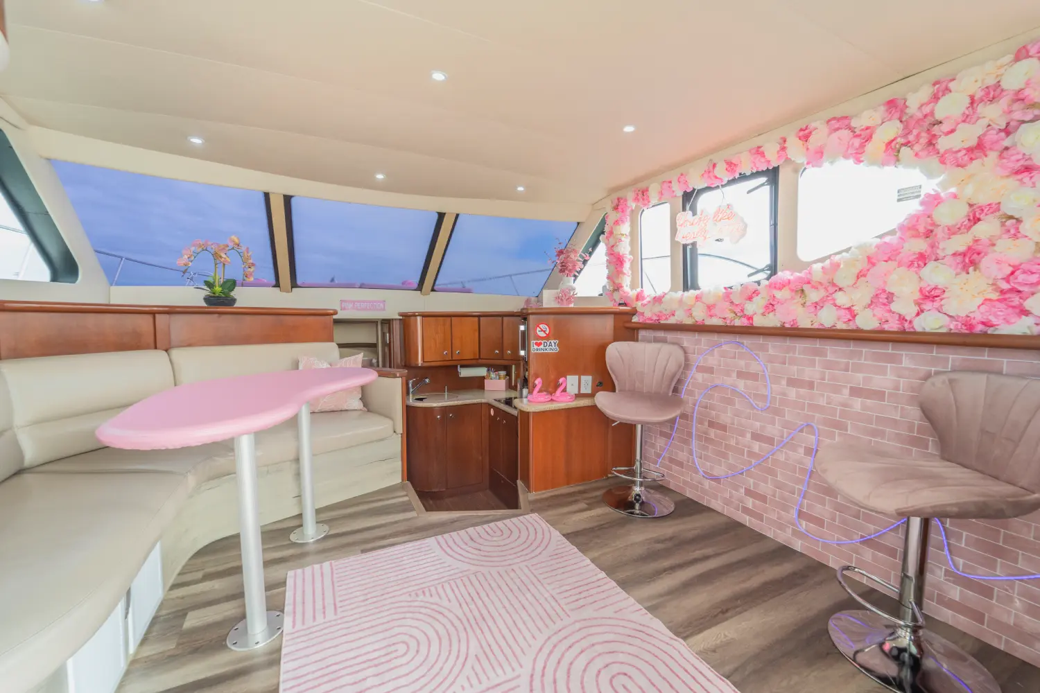 41ft pink Silverton yacht Miami salon with pink flower wall