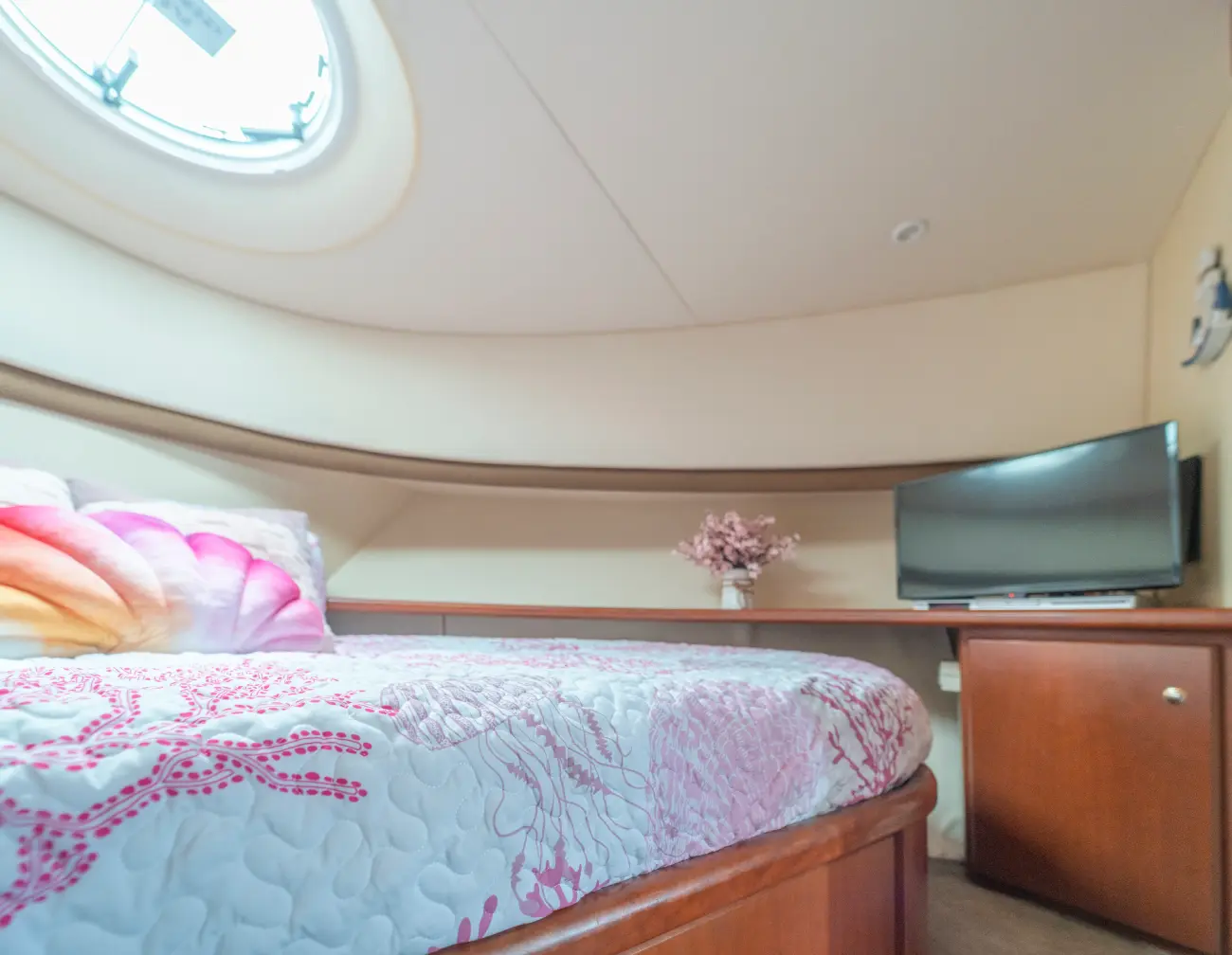 41ft pink Silverton yacht Miami stateroom with pink coral bedding