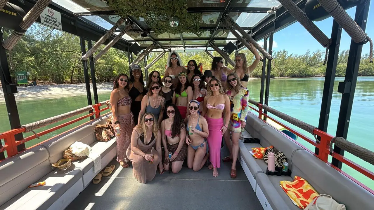 Cat Lux party boat deck setup with boho decorations in Miami