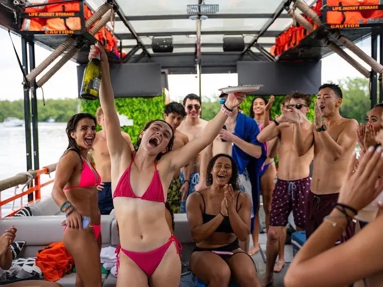 Cat Lux Party Cruiser close-up on the water in Miami