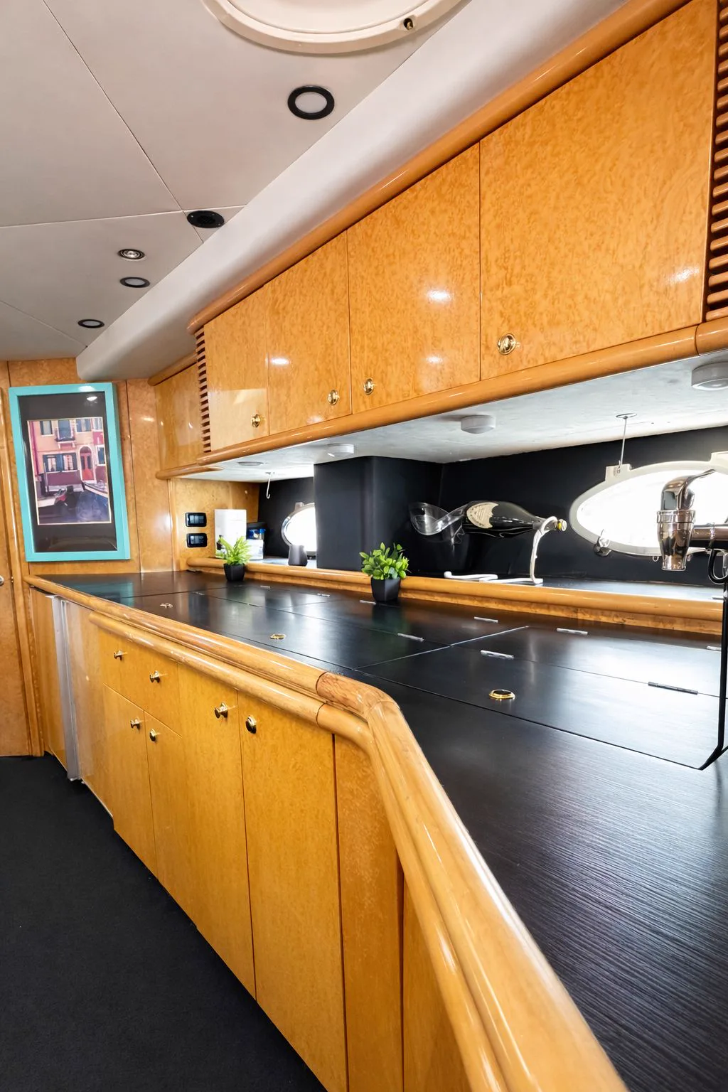 Galley counter with wood cabinets on the 60ft Tiffany Predator yacht