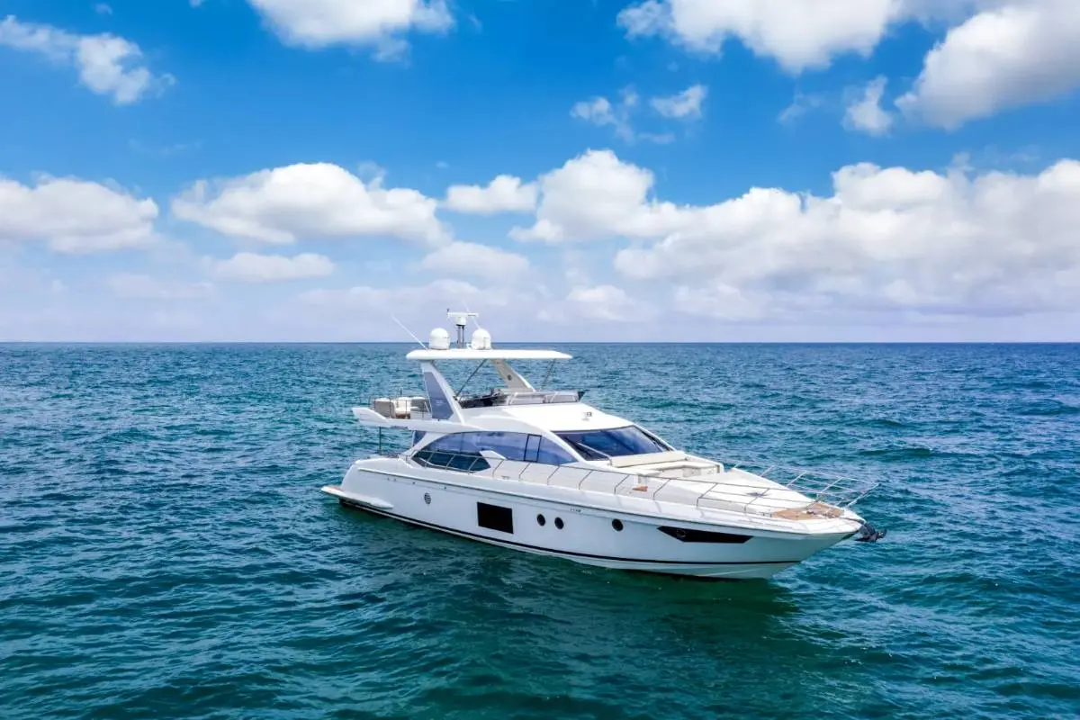 70ft Azimut Flybridge Miami aerial bow view over turquoise water