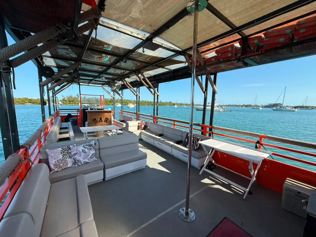 Spacious bow and shaded lounge seating on the Cat Lux 50ft party catamaran rental in Miami