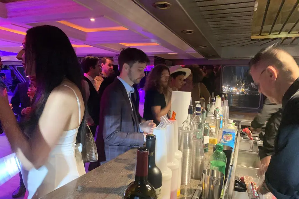 Luxury dining salon setup for corporate event on Miami yacht