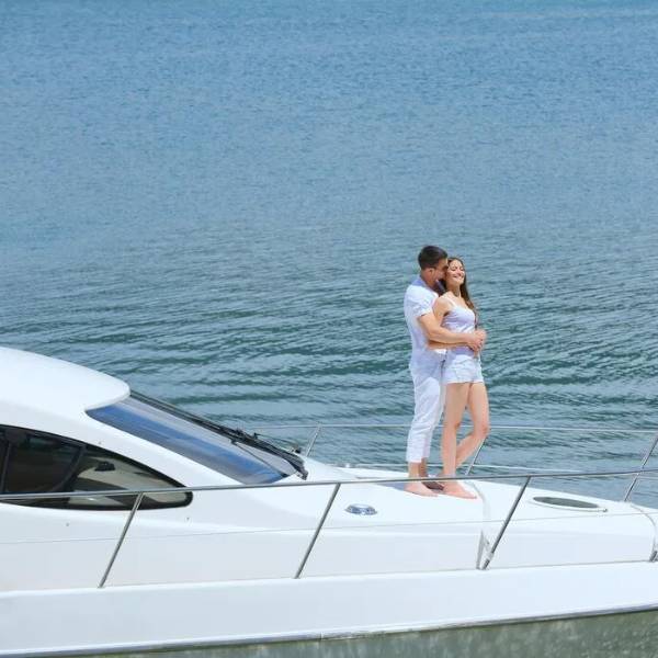 Luxury yacht cruising Biscayne Bay at golden hour