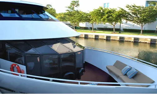 Miami yacht rental Mid Sun 100ft bow view private charter moored at dock