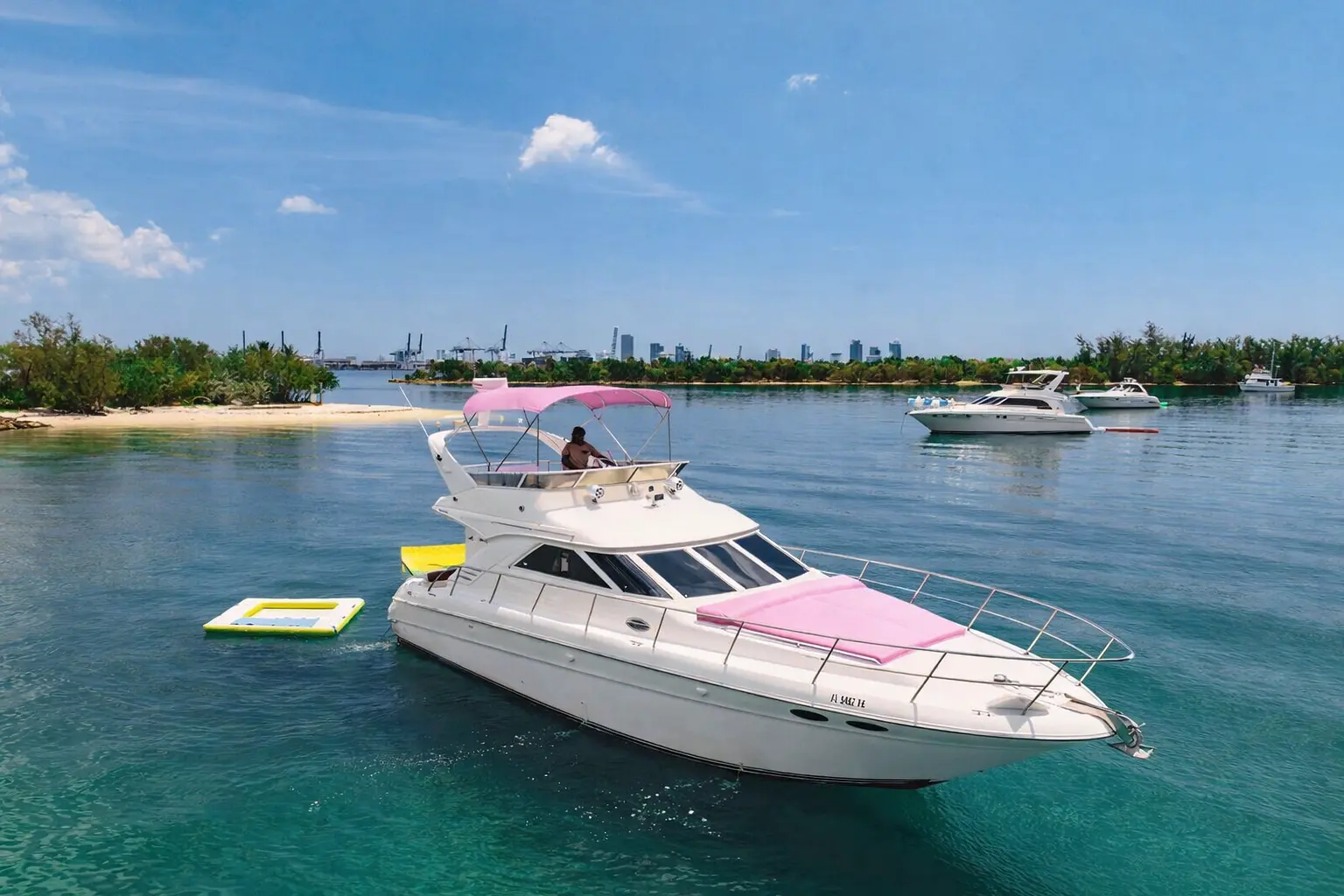 50ft Pink Horizon yacht anchored near sandbar on Biscayne Bay Miami