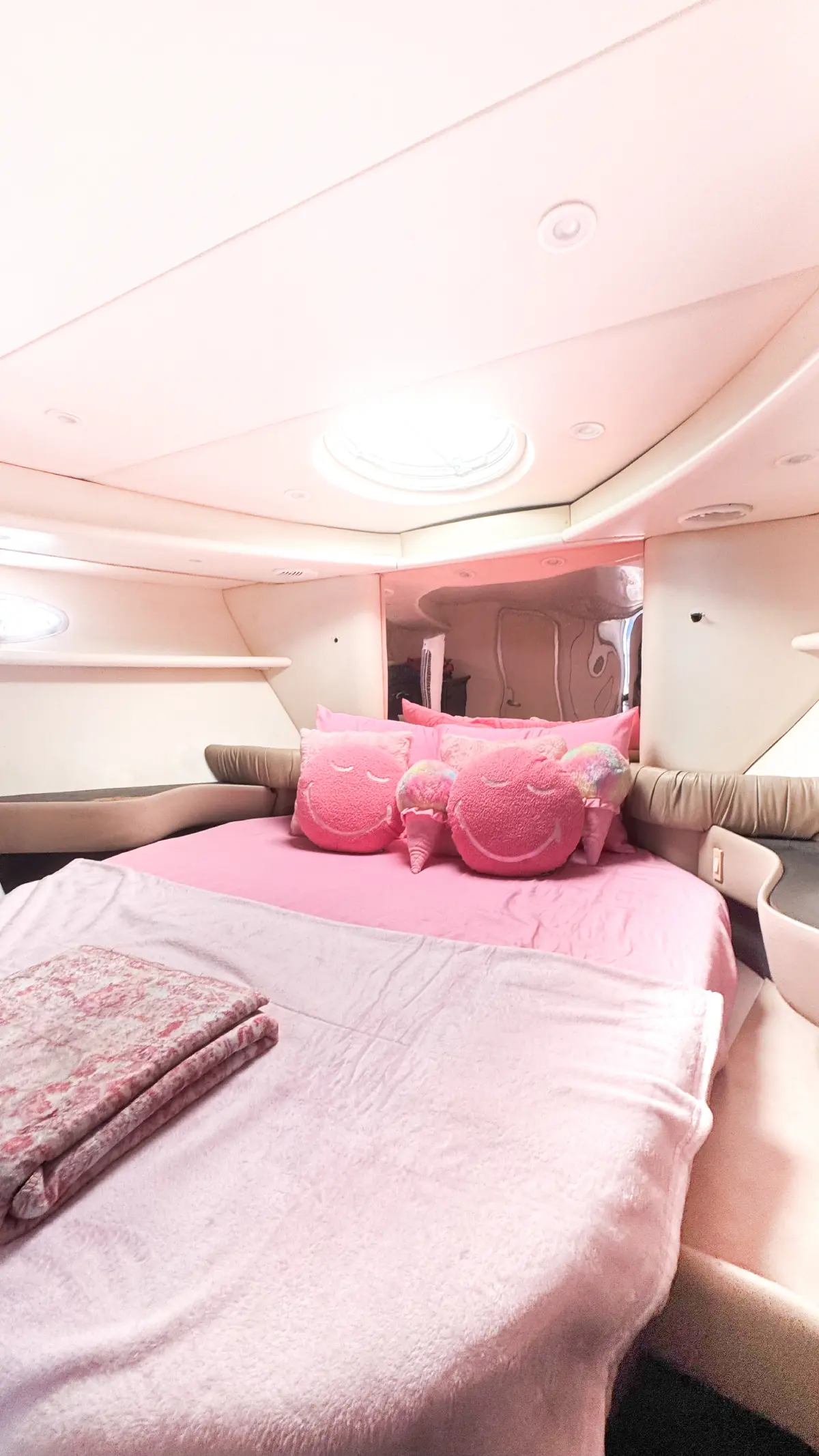 46ft pink yacht Miami stateroom bed with pink blanket