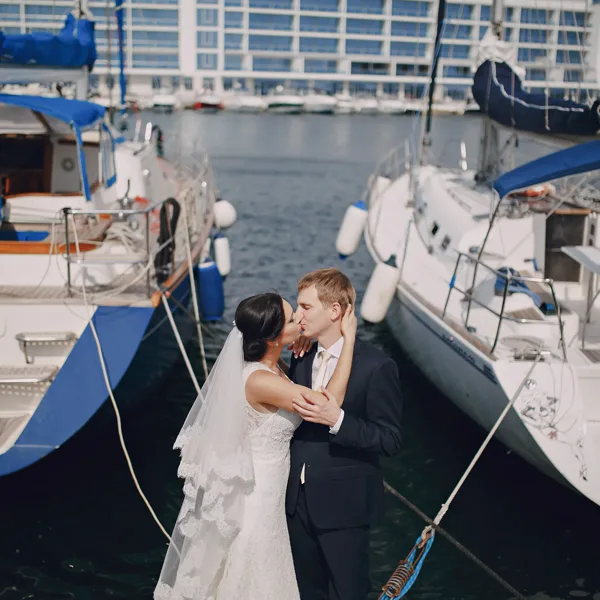 Couple kissing on a romantic yacht charter in Miami