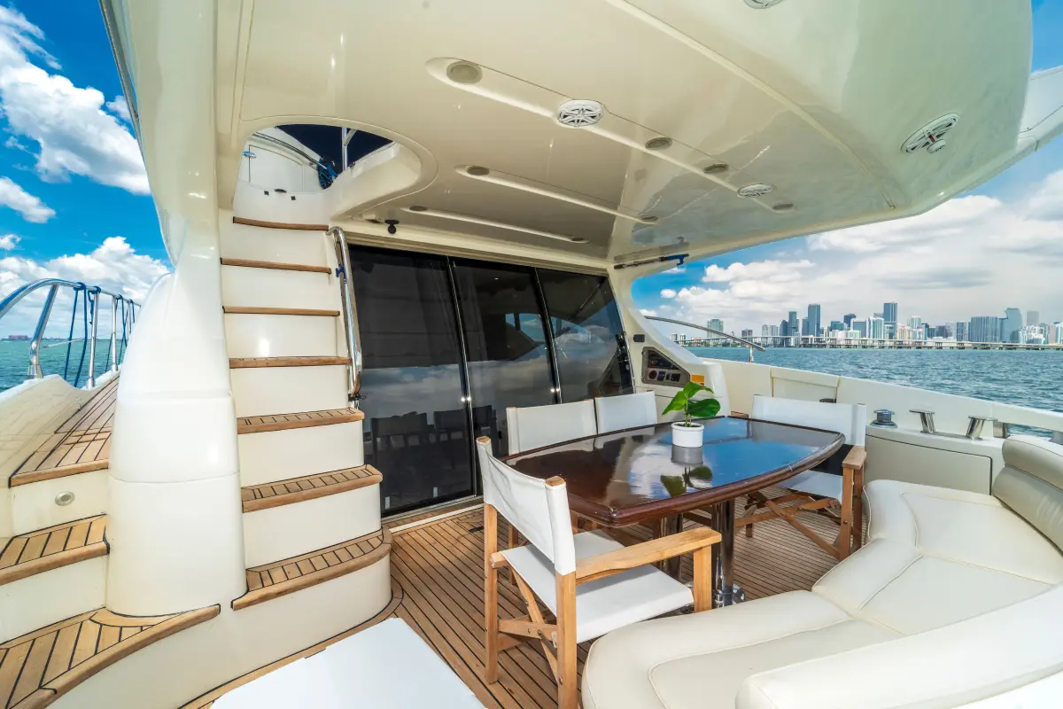 65ft Sea La Vie Azimut Flybridge Miami sundeck with umbrella and sun loungers