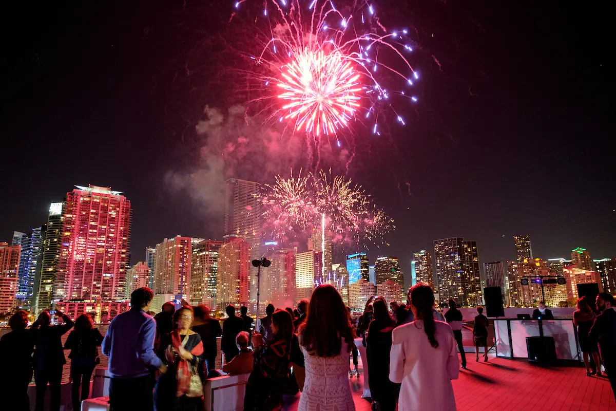 Spectacular fireworks view from the deck during a miami party cruise on the Sea Yacht